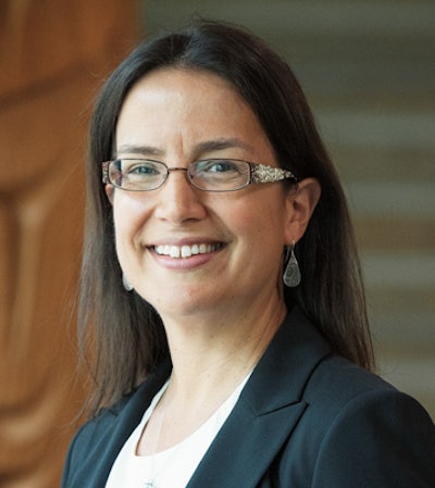Dr Nadine Caron